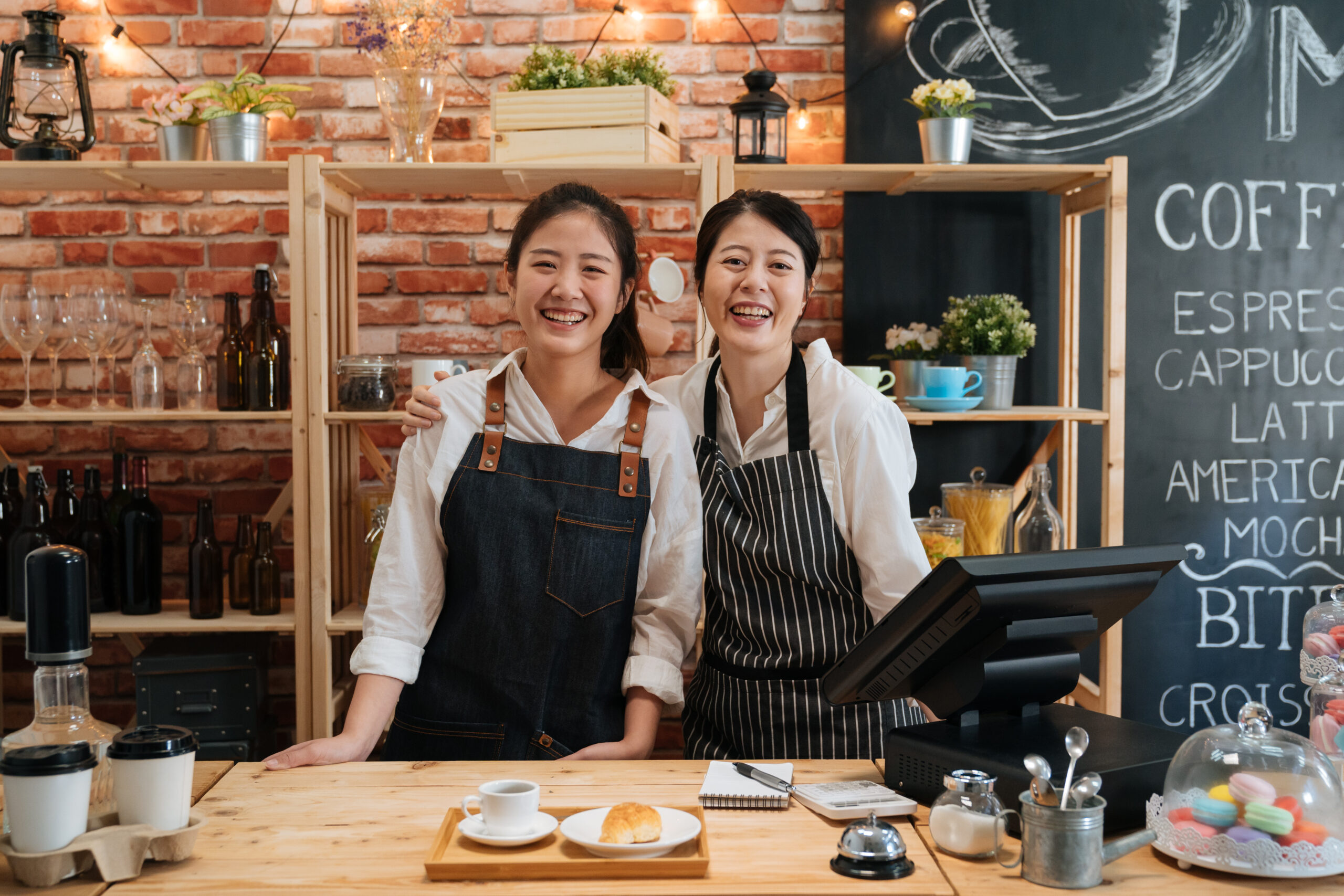 Small Startup Business Owner Concept, Two Successful Young Baristas Women
